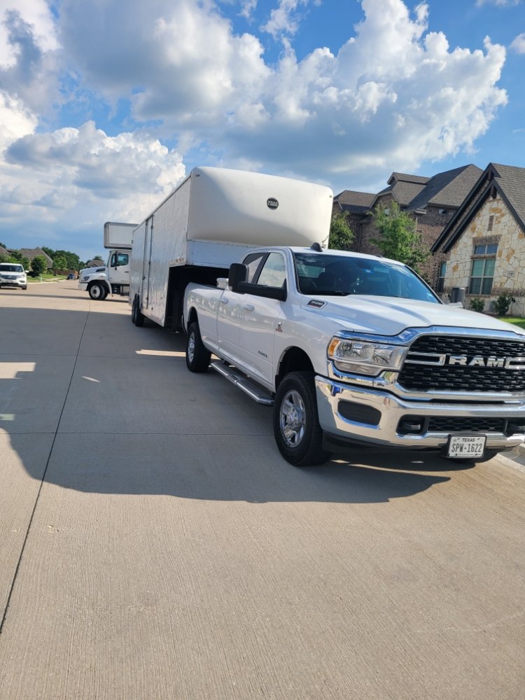 All in the Family Moving truck and enclosed trailer ready for a move